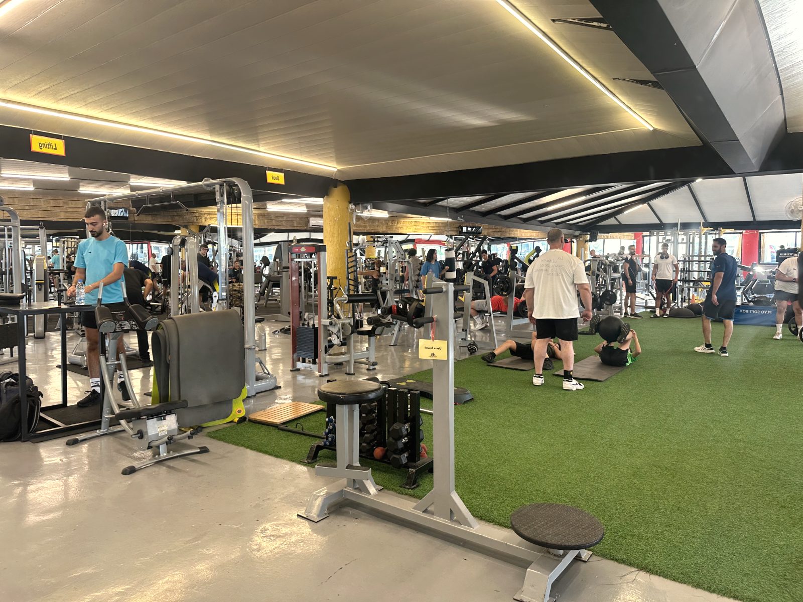 Free-weights zone with racks and mirrors at North Fitness